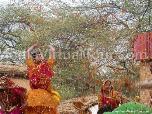 Artists from Uttar Pradesh playing holi with flowers