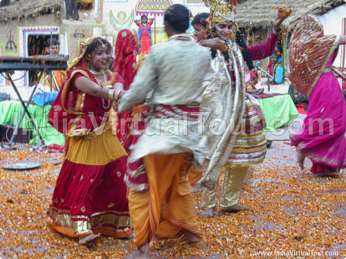 Artists from Uttar Pradesh playing holi with flowers