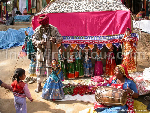 A kid enjoying puppet show